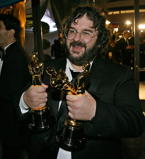 Director Peter Jackson holds the three Oscars he won for his work on The Lord of the Rings -The Return of the King at the 76th annual Academy Awards, Los Angeles, February 29, 2004.